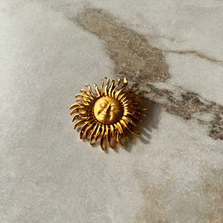 Broche soleil vintage Monet