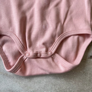 Cache-couche rose Deux par Deux 6 mois