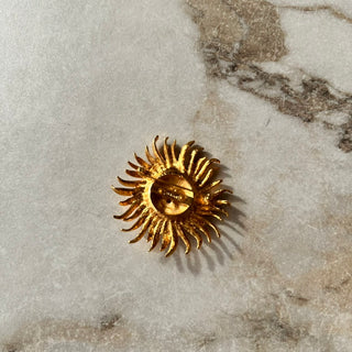 Broche soleil vintage Monet