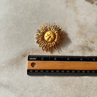 Broche soleil vintage Monet