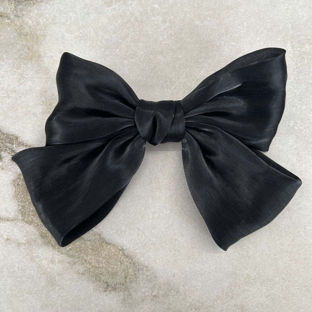 Pince à cheveux noire avec boucle Tian Tian