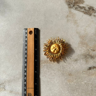 Broche soleil vintage Monet