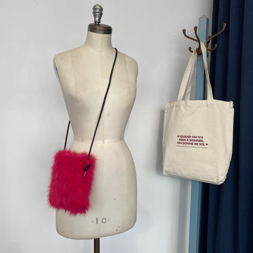 Sac pochette en fausse fourrure rose