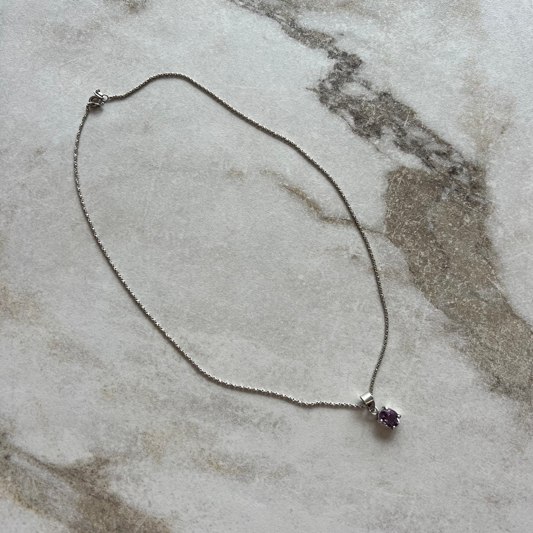 Collier pendentif mauve
