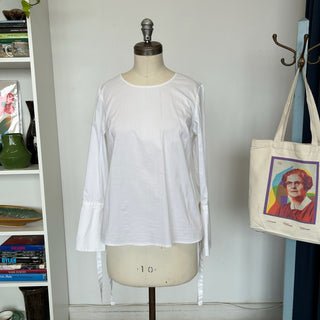 Blouse blanche avec boucles Dalia