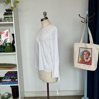 Blouse blanche avec boucles Dalia