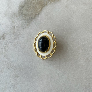Broche beige noir doré ronde