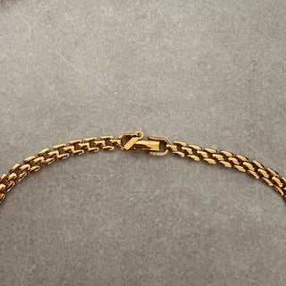 Collier doré Monet