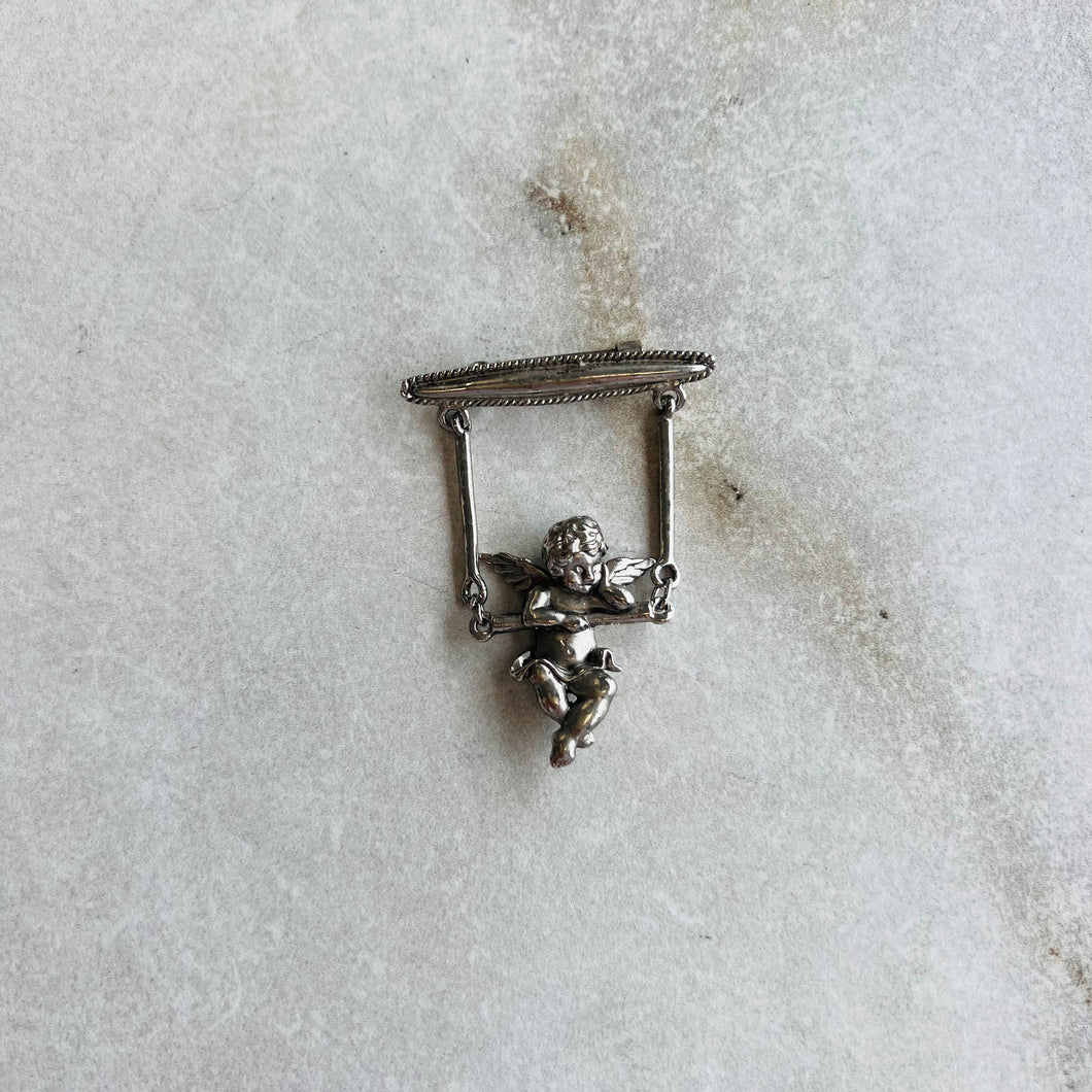 Broche chérubin